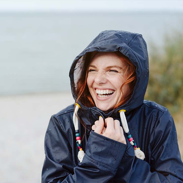 Laughing woman at the beach